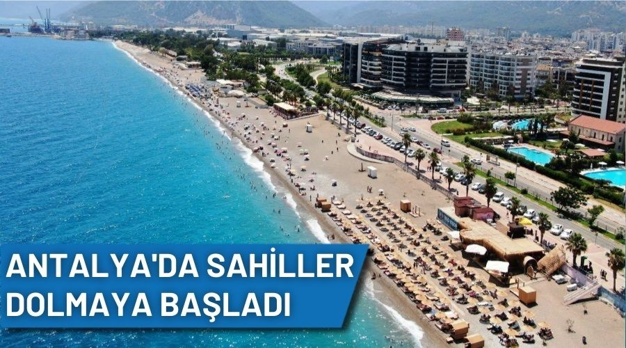 Antalya'da tatilciler sahilleri doldurmaya ba�lad�